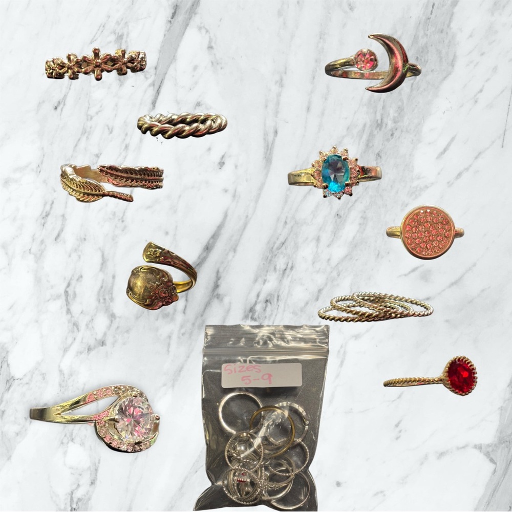 Assortment of silver rings.